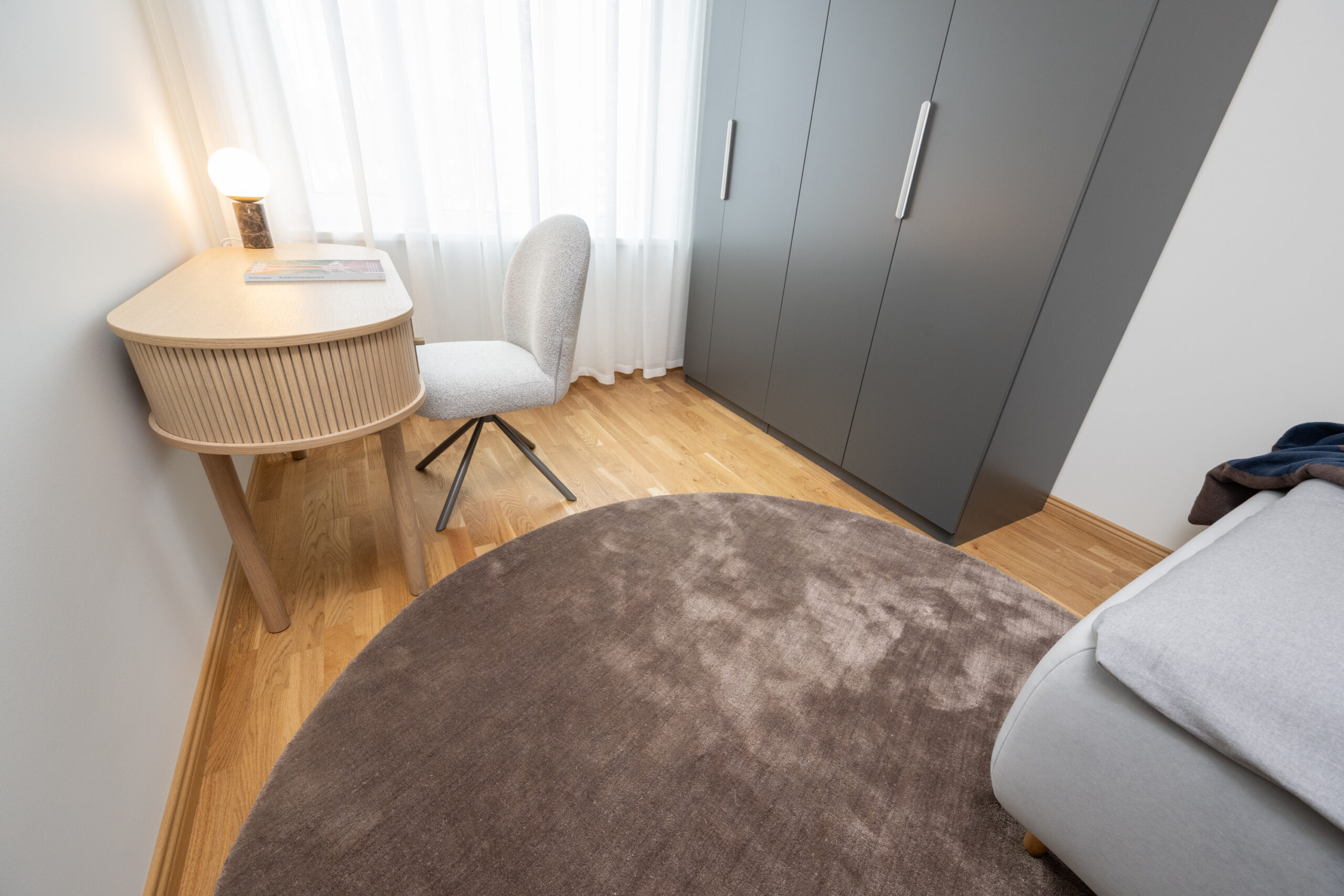 Ümmargune PET materjalist vaip - pruun